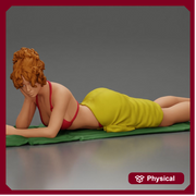 Relaxing on a beach towel, a woman enjoys sunbathing, wrapped in a pareo beach cover and bikini - Only-Games