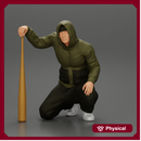 gangster homie in hoodie sitting holding a baseball bat