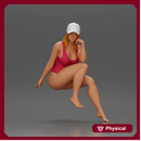 Woman in Swimsuit and Cap Sitting Thoughtfully in Relaxed Pose