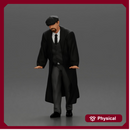 Man in black coat wearing flat cap standing with serious expression