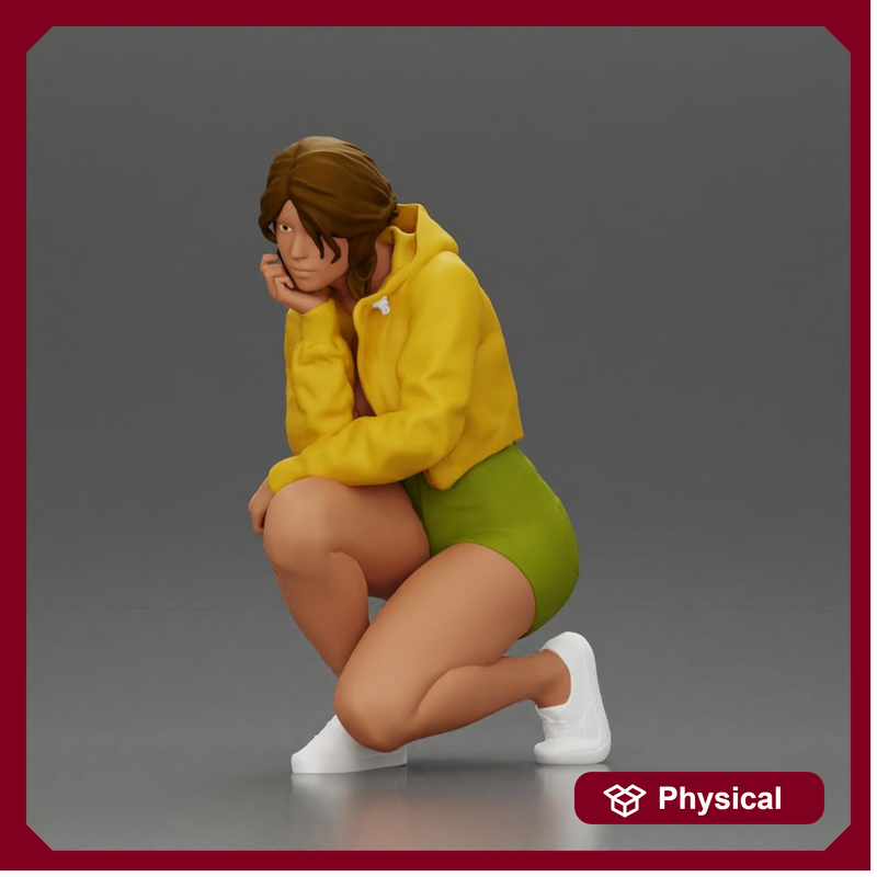 Performer crouching thoughtfully in yellow jacket green shorts white sneakers