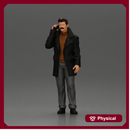 Turkish man in a coat with sweater standing talking on the mobile phone