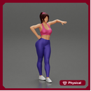 Sexy fitness girl leaning on a wall while standing outdoors