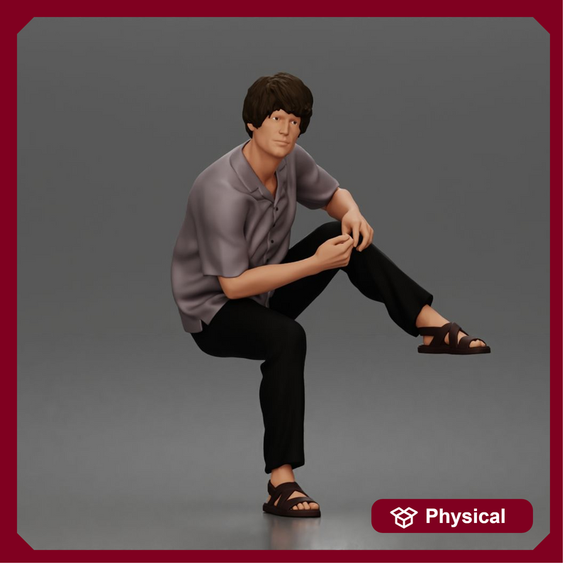 Man Sitting With Knee Bent In Shirt Trousers And Sandals