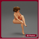 Naked sexy woman sitting