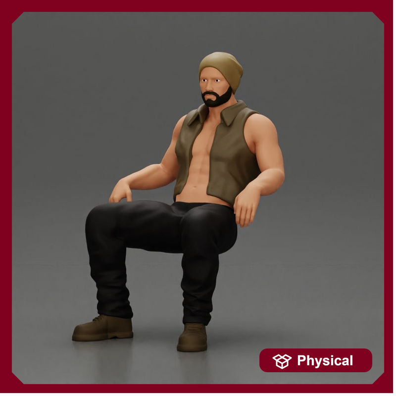 Muscular Bearded Man in Beanie Vest Pants Sitting Casually Relaxed
