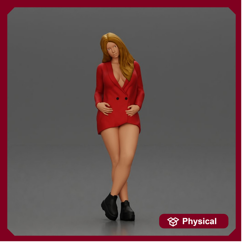 Stylish woman in red blazer dress and boots posing with crossed legs
