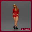 Stylish woman in red blazer dress and boots posing with crossed legs