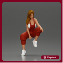 Street dancer in red overalls sitting stylishly on parked car