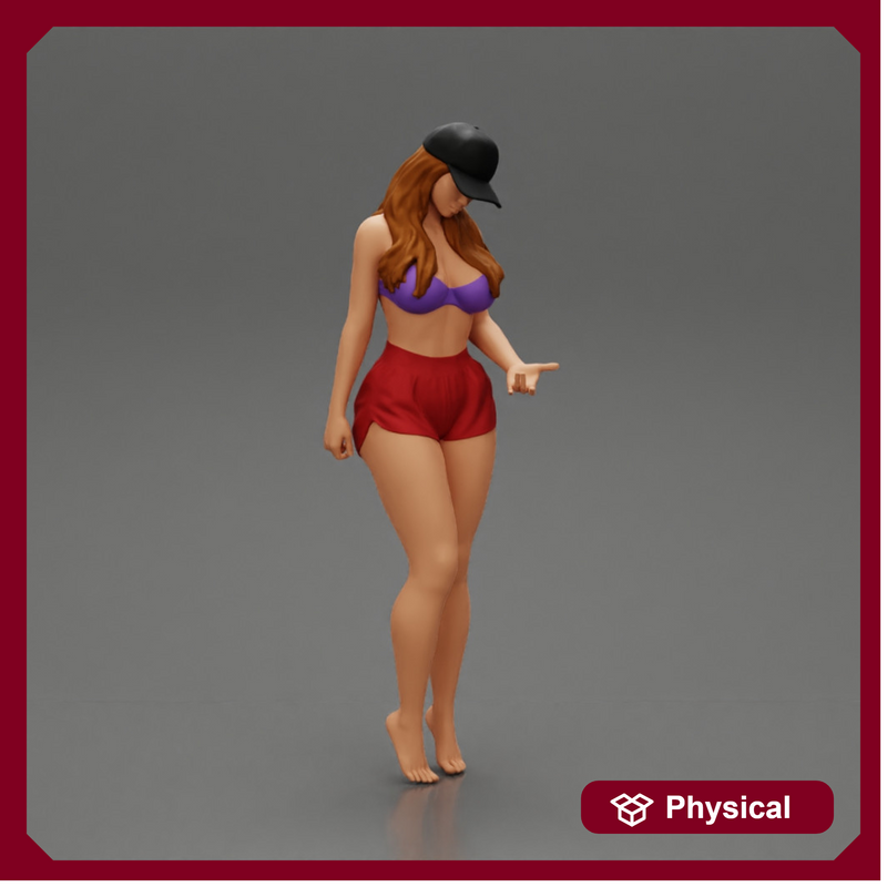 Sexy Girl standing in Cap and Shorts With Posing