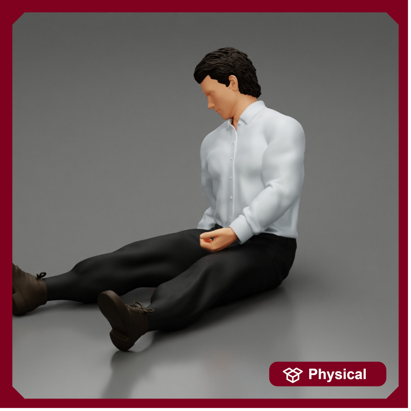 Accident of a male worker sitting on the floor with an injured