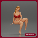 sexy girl in a bikini posing on the beach sitting at the deck chair