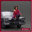 lowrider girl sitting on a car, wearing boots and a stylish shirt