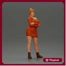 Woman in Orange Dress and Boots Stands Stylishly Confidence With Arms Crossed