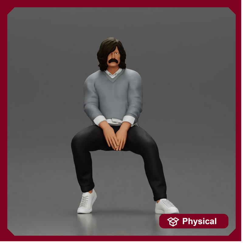 Man in Casual Sweater and Sneakers Sitting with Relaxed Posture