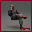 man in leather jacket and jeans sitting cross legged and thinking