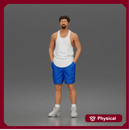 Man stands hands in pockets wearing tanktop shorts sneakers appearing relaxed