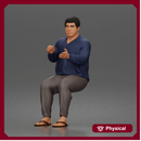 Asian Man sits gesturing while wearing casual sweater pants flip flops comfortably