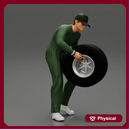 Auto mechanic walking and carrying tyre