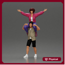 Man in shorts carrying girlfriend on shoulders girl being carried on the man's shoulders