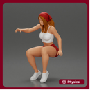 girl sitting in shorts and a scarf hair wants to grab something
