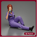 Tired woman mechanic sitting and drinking water during from bottle