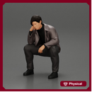 Worried man in a leather jacket sitting and thinking