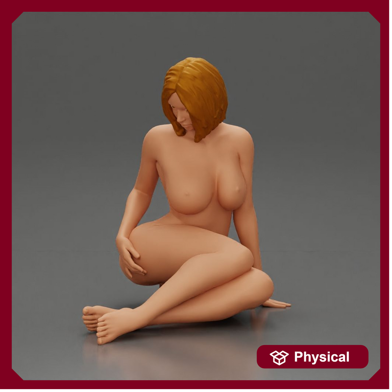 Naked Woman sitting gracefully on the floor with a relaxed pose