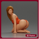 Beautiful Woman in One-Piece Bikini in a Kneeling Pin-Up Pose on the Beach