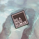 Be a nice Human' Pin