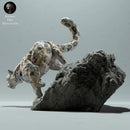Snow Leopard on a Boulder - Only-Games